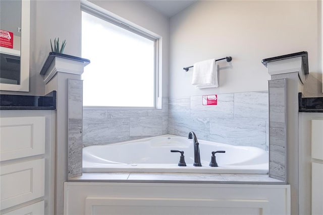 bathroom with a bathing tub