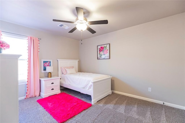 carpeted bedroom with ceiling fan