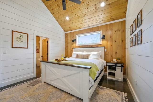 bedroom with vaulted ceiling, connected bathroom, wooden walls, dark wood-type flooring, and wooden ceiling