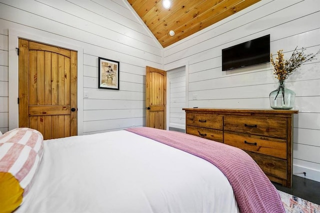 bedroom with wood ceiling and vaulted ceiling