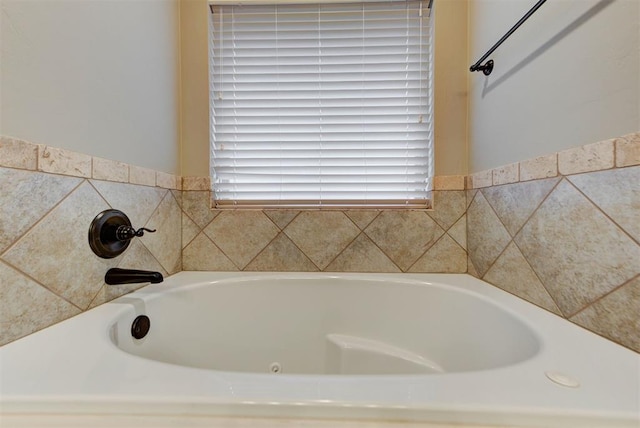 bathroom featuring a washtub