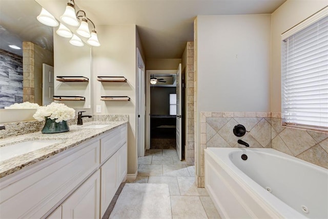 bathroom featuring vanity, a bath, tile patterned floors, and ceiling fan