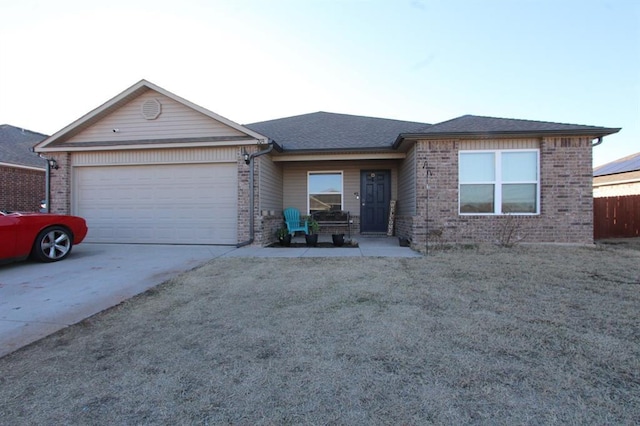 ranch-style house featuring a garage