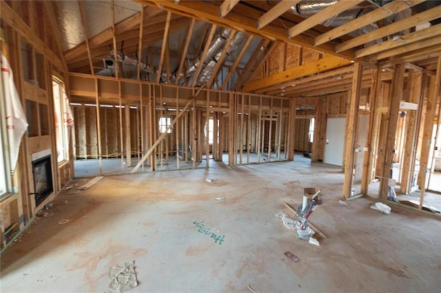 misc room with a glass covered fireplace
