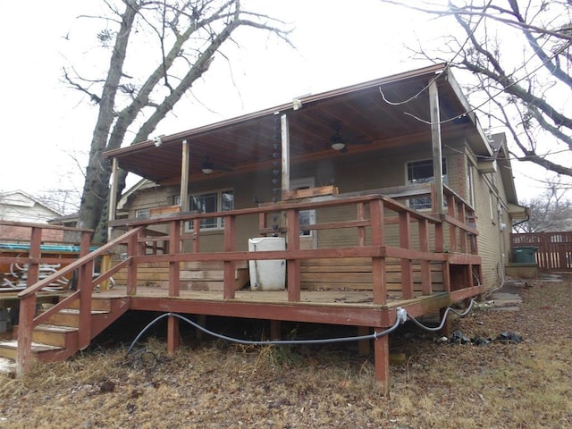 rear view of house with a wooden deck