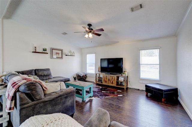 living room with vaulted ceiling, dark wood-type flooring, and ceiling fan