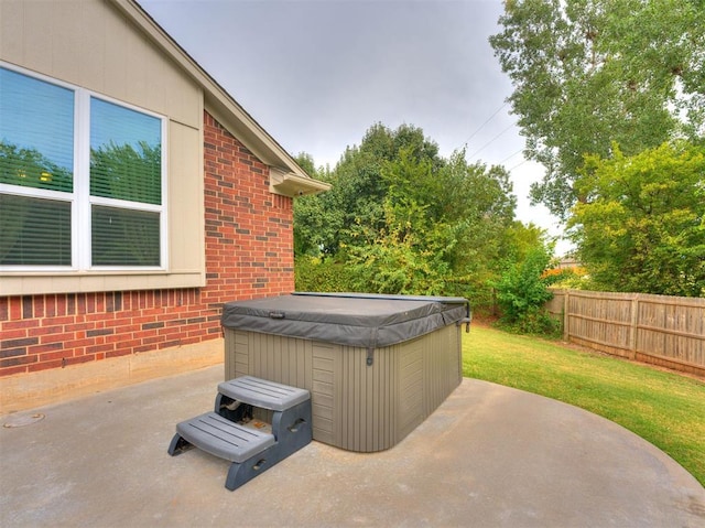 view of patio / terrace featuring a hot tub