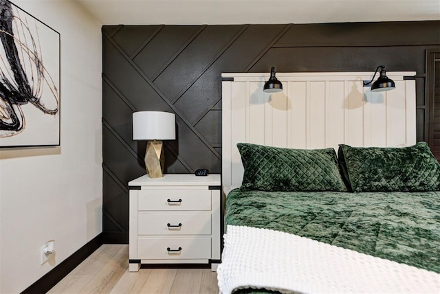 bedroom with light hardwood / wood-style floors