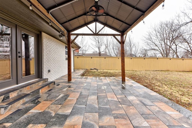 view of patio / terrace featuring a gazebo and ceiling fan