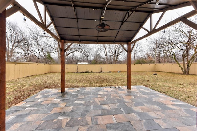 view of patio / terrace featuring ceiling fan