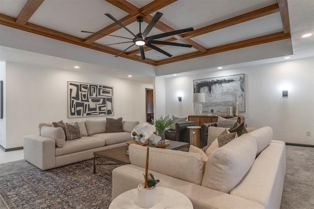 living room with ceiling fan, coffered ceiling, beam ceiling, and carpet