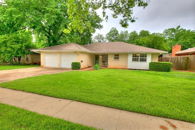 ranch-style home with a front yard, a garage, brick siding, fence, and concrete driveway
