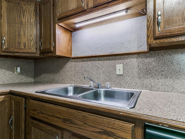 kitchen with ventilation hood and sink