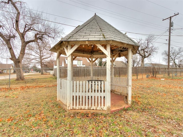 surrounding community featuring a gazebo and a lawn