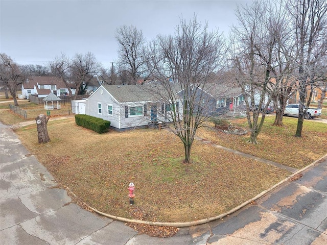 ranch-style house with a front yard