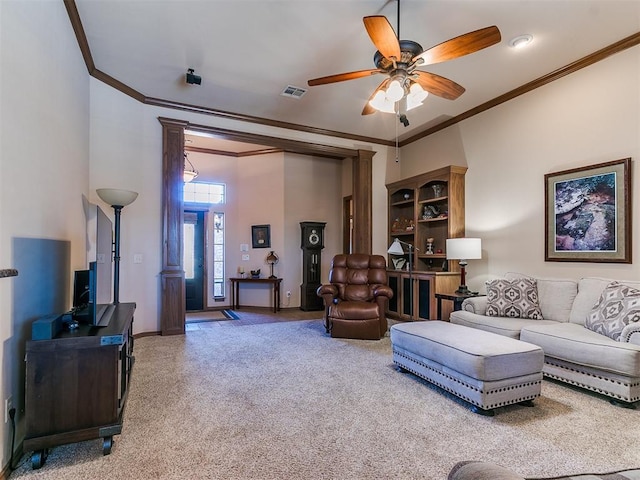 carpeted living room featuring ceiling fan, ornamental molding, and a high ceiling