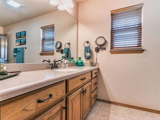 bathroom featuring vanity and tile patterned flooring