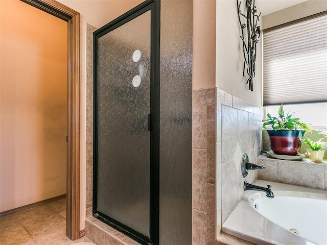 bathroom featuring tile patterned flooring and plus walk in shower