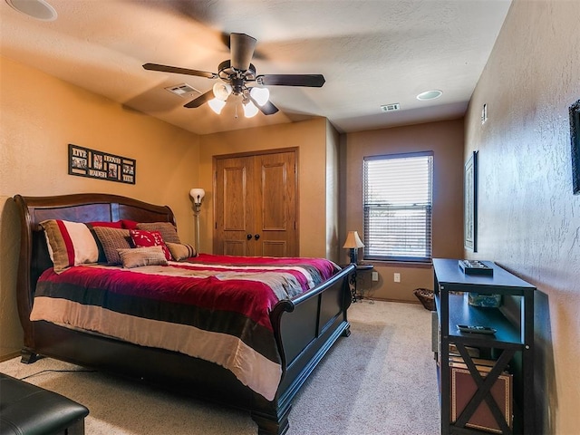 bedroom featuring ceiling fan and carpet floors