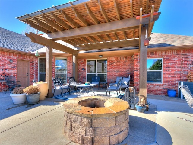 view of patio / terrace featuring a fire pit