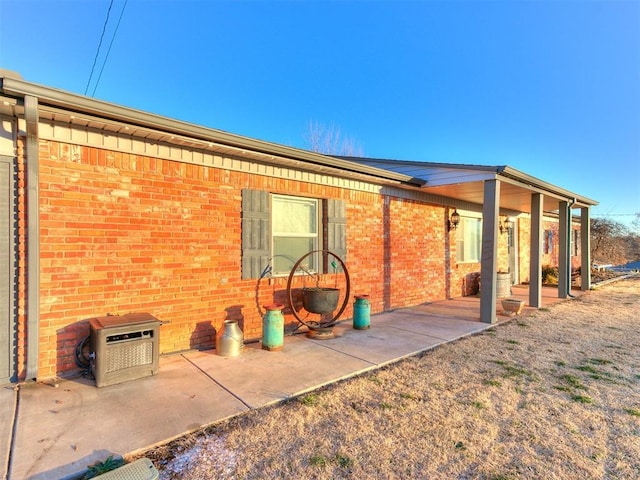 back of house featuring a patio area