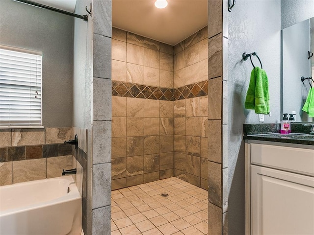 bathroom with independent shower and bath and vanity