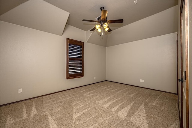 bonus room with vaulted ceiling, ceiling fan, and carpet floors