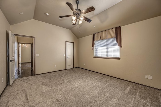 unfurnished bedroom with vaulted ceiling, ceiling fan, and carpet flooring