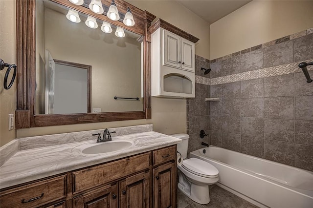 full bathroom with vanity, toilet, tiled shower / bath combo, and tile patterned flooring