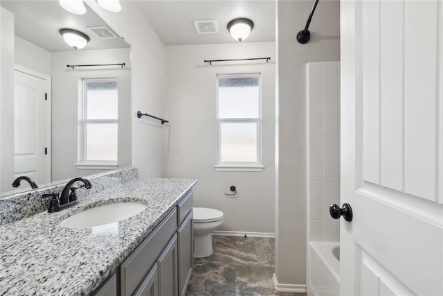 full bathroom with shower / tub combination, vanity, toilet, and a wealth of natural light