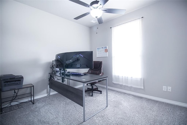 home office featuring carpet floors and ceiling fan