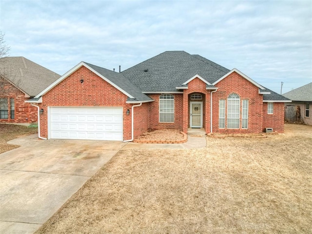 view of front of property featuring a garage