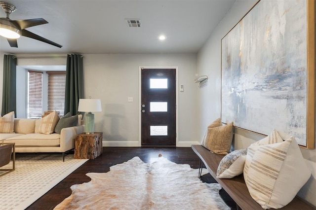 entrance foyer with dark hardwood / wood-style floors and ceiling fan