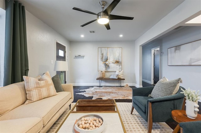 living room with ceiling fan