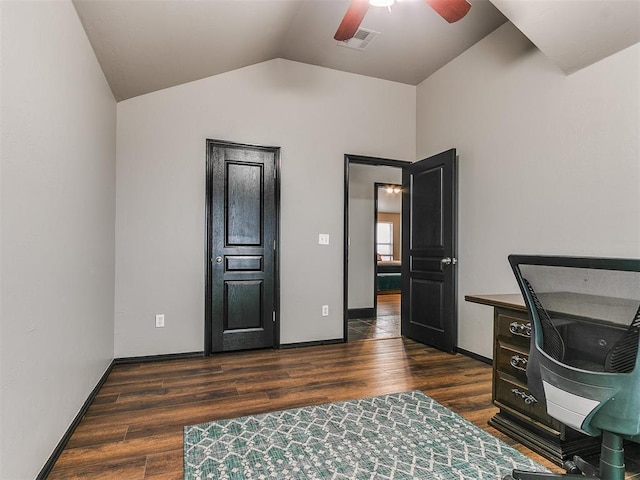 office featuring ceiling fan, lofted ceiling, and dark hardwood / wood-style flooring