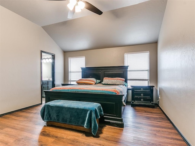 bedroom featuring lofted ceiling, hardwood / wood-style floors, and ceiling fan