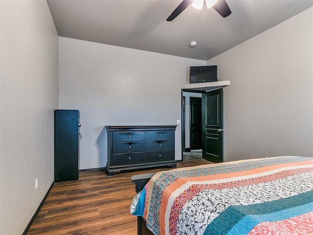 bedroom featuring dark wood-type flooring and ceiling fan