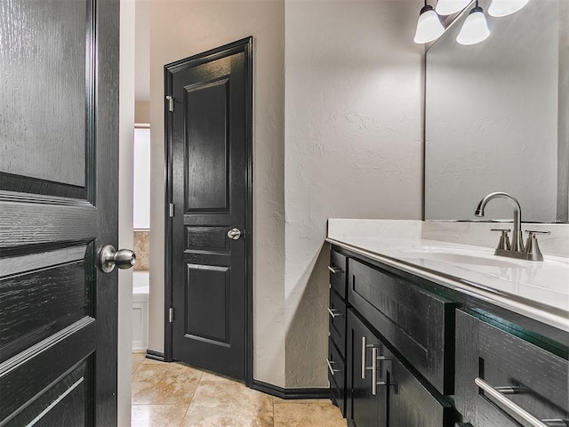 bathroom with vanity and tile patterned floors