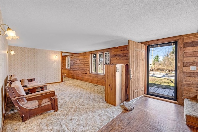 foyer entrance with a textured ceiling