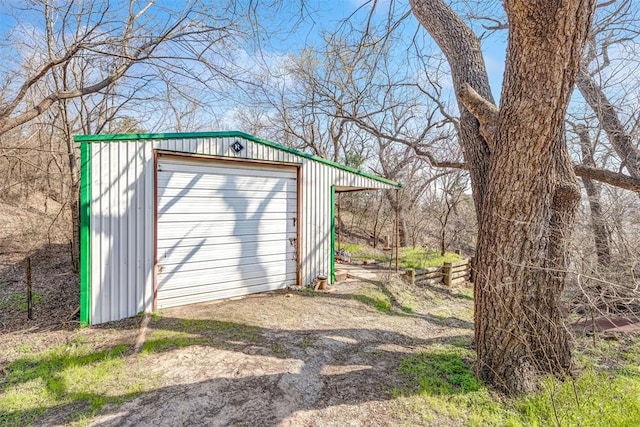 view of outdoor structure with a garage