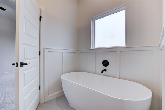 bathroom with a washtub