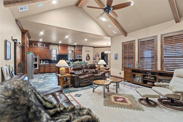 living room with beam ceiling, ceiling fan with notable chandelier, and high vaulted ceiling