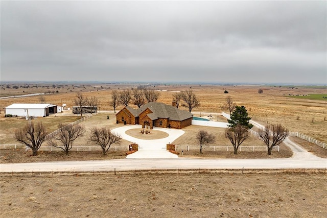 exterior space with a rural view