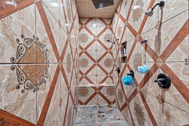 bathroom view of tiled shower