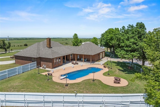 view of pool featuring a patio area and an outdoor fire pit