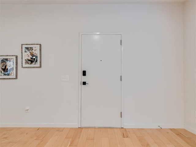 foyer featuring hardwood / wood-style flooring