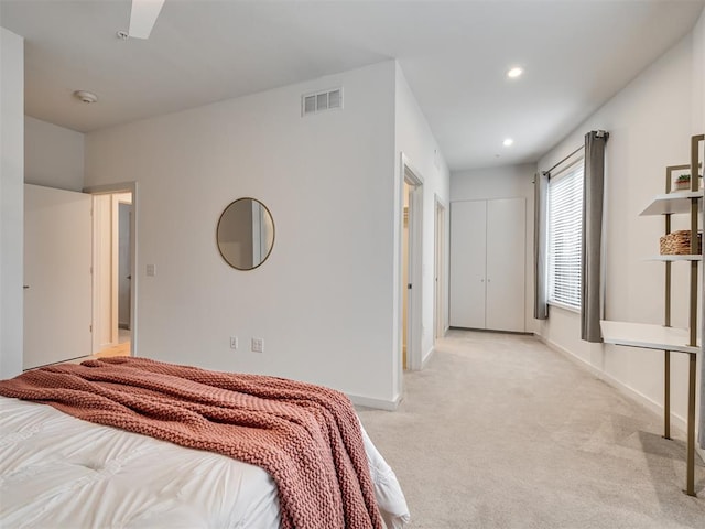 bedroom with light carpet