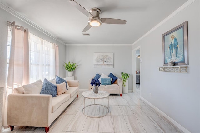 living room featuring ceiling fan and ornamental molding