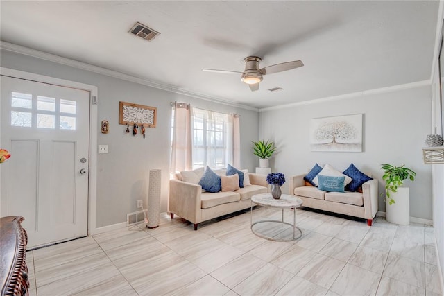 living room with crown molding and ceiling fan