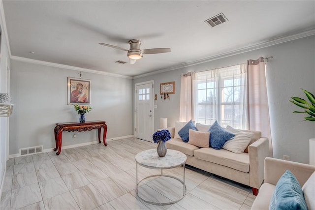 living room featuring ceiling fan and ornamental molding